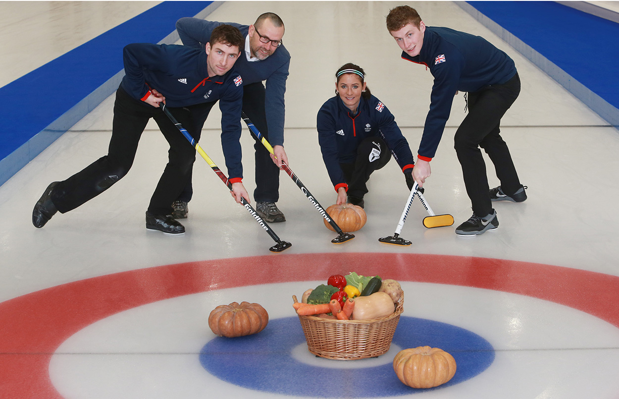Eve, Glen and Thomas Muirhead on the ice with Iain Gulland